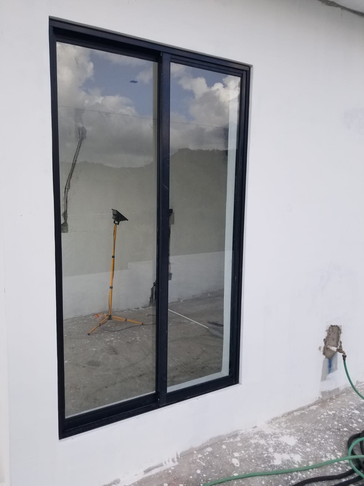 Aluminium windows with finished interior walls