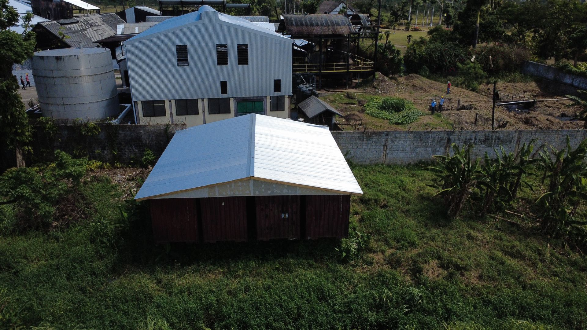 Finished zinc roof over containers at Hampden Distillery