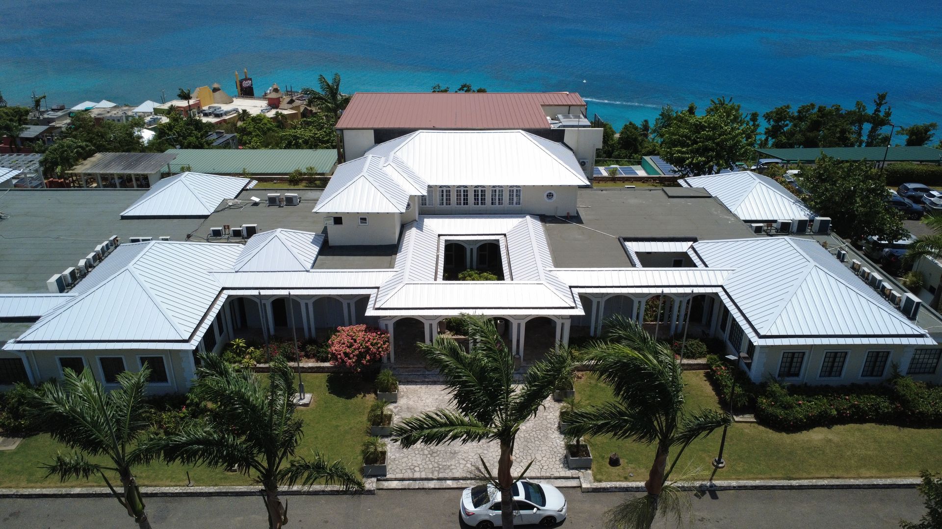 New roofs on coastal buildings in Montego Bay, aerial view