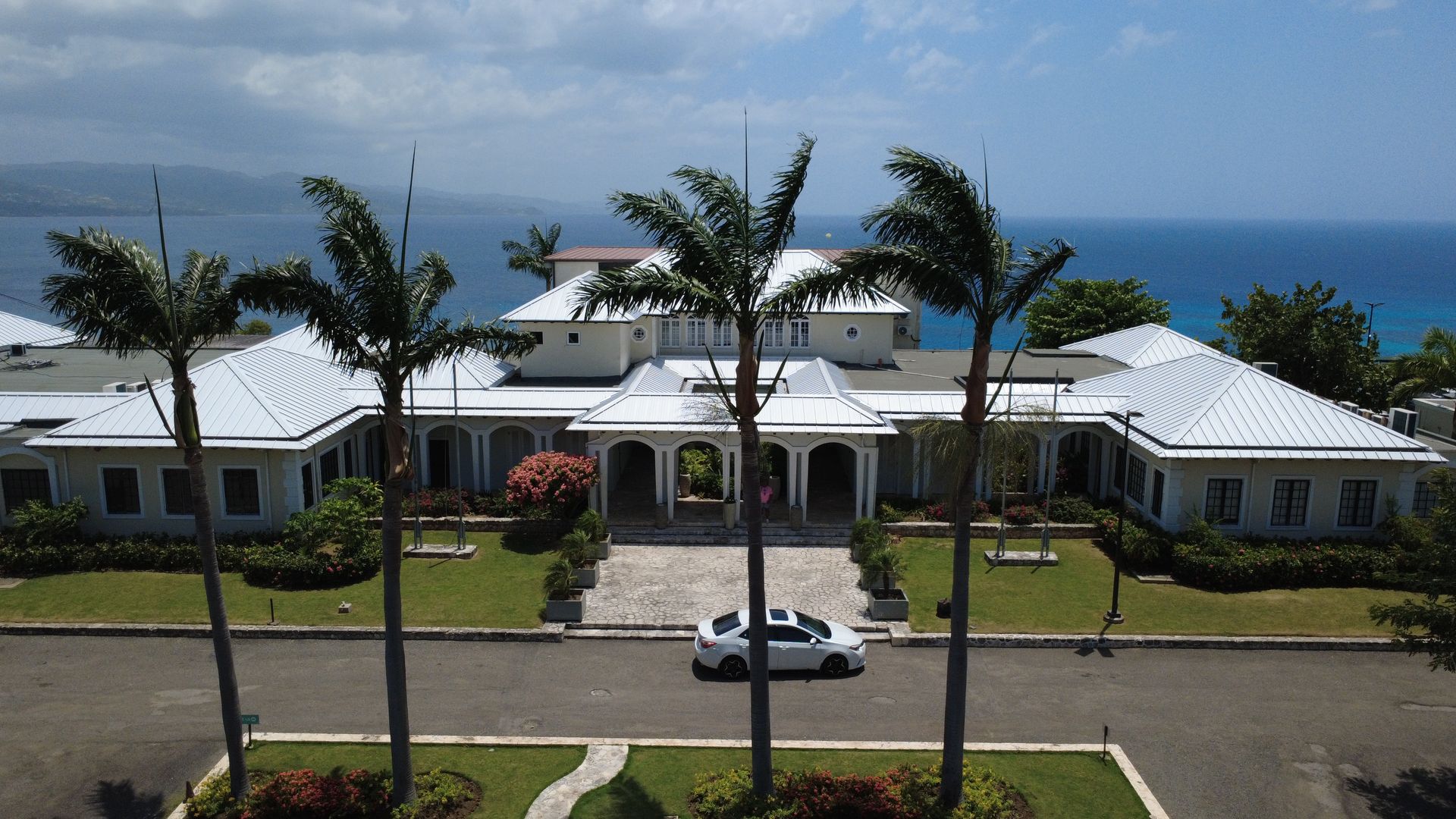 Standing seam metal roof by DaSilva Construction, aerial view over Jamaica