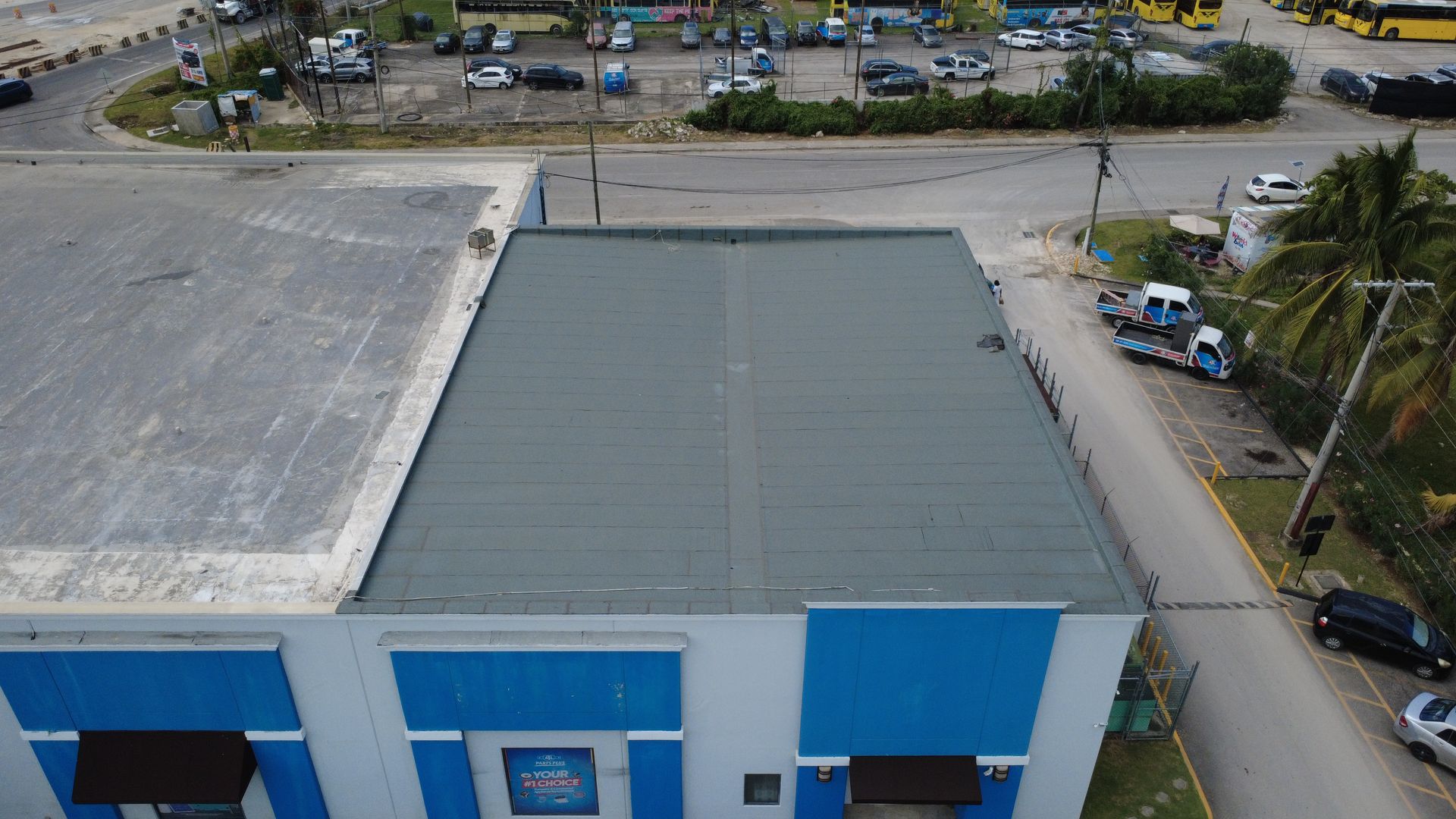 Flat membrane roof over a retail building in Montego Bay